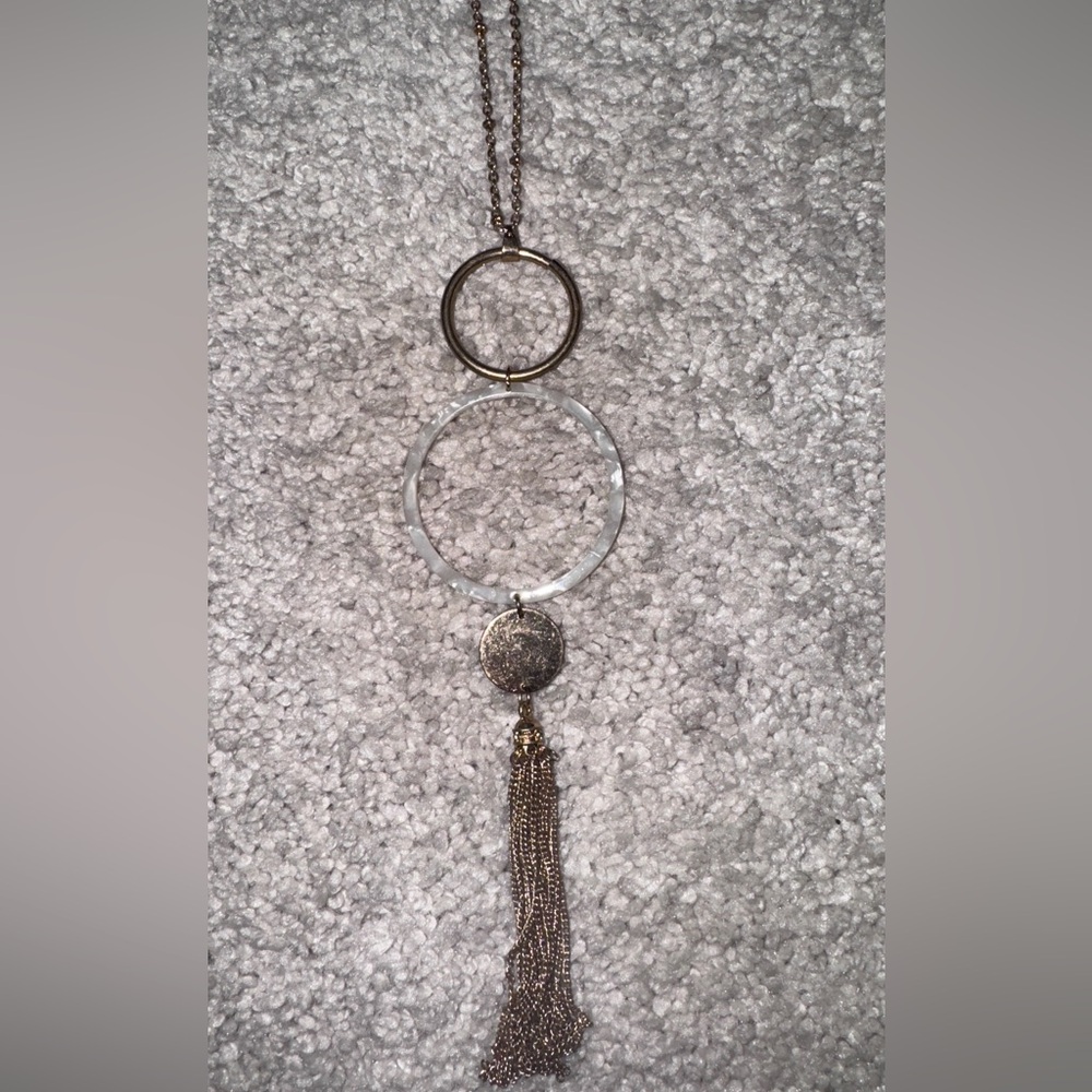 Elegant Gold and White Tassel Pendant